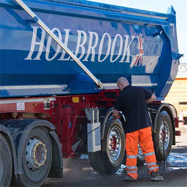 Artic steel body truck being refilled by one of Rorys drivers