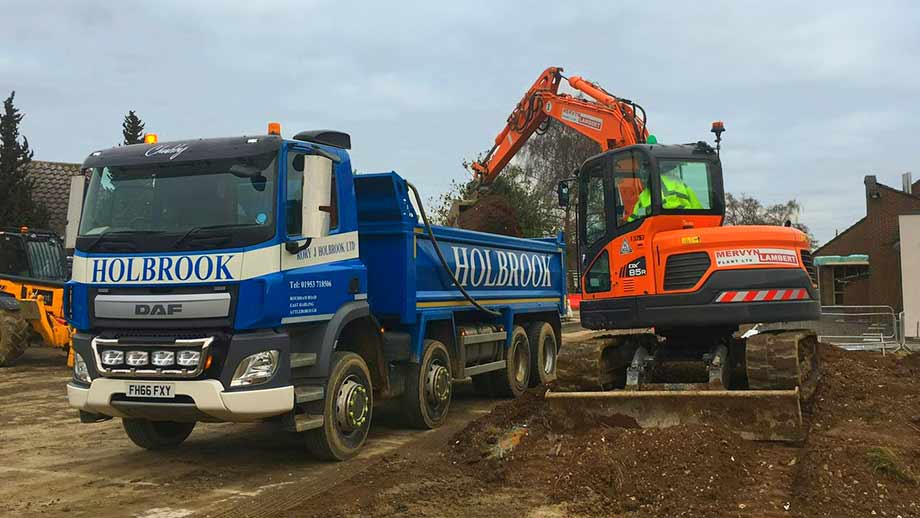 Excavator loading muckaway